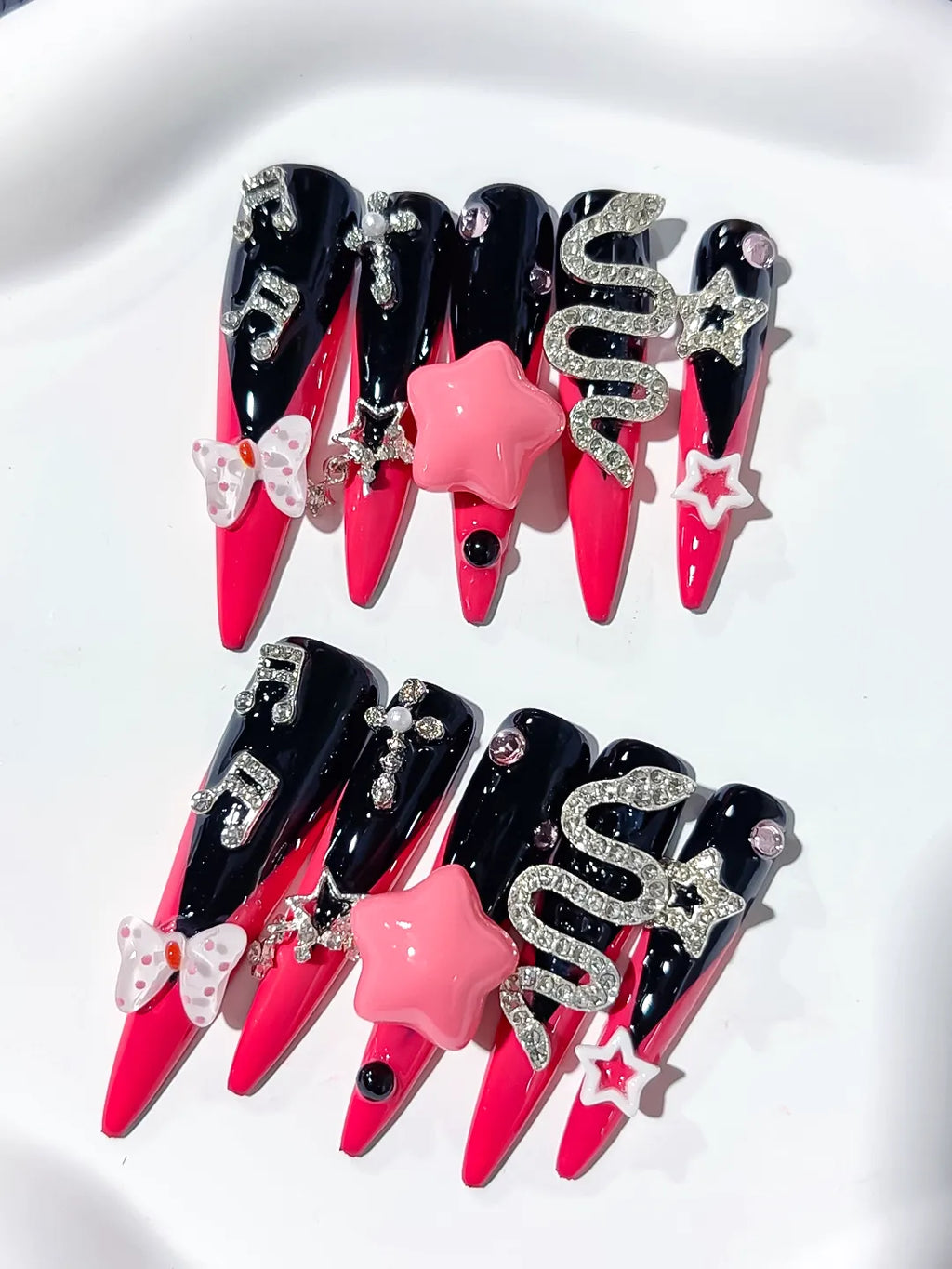M101 - Long Pink Black Stiletto Abstract Bow Rhinestone