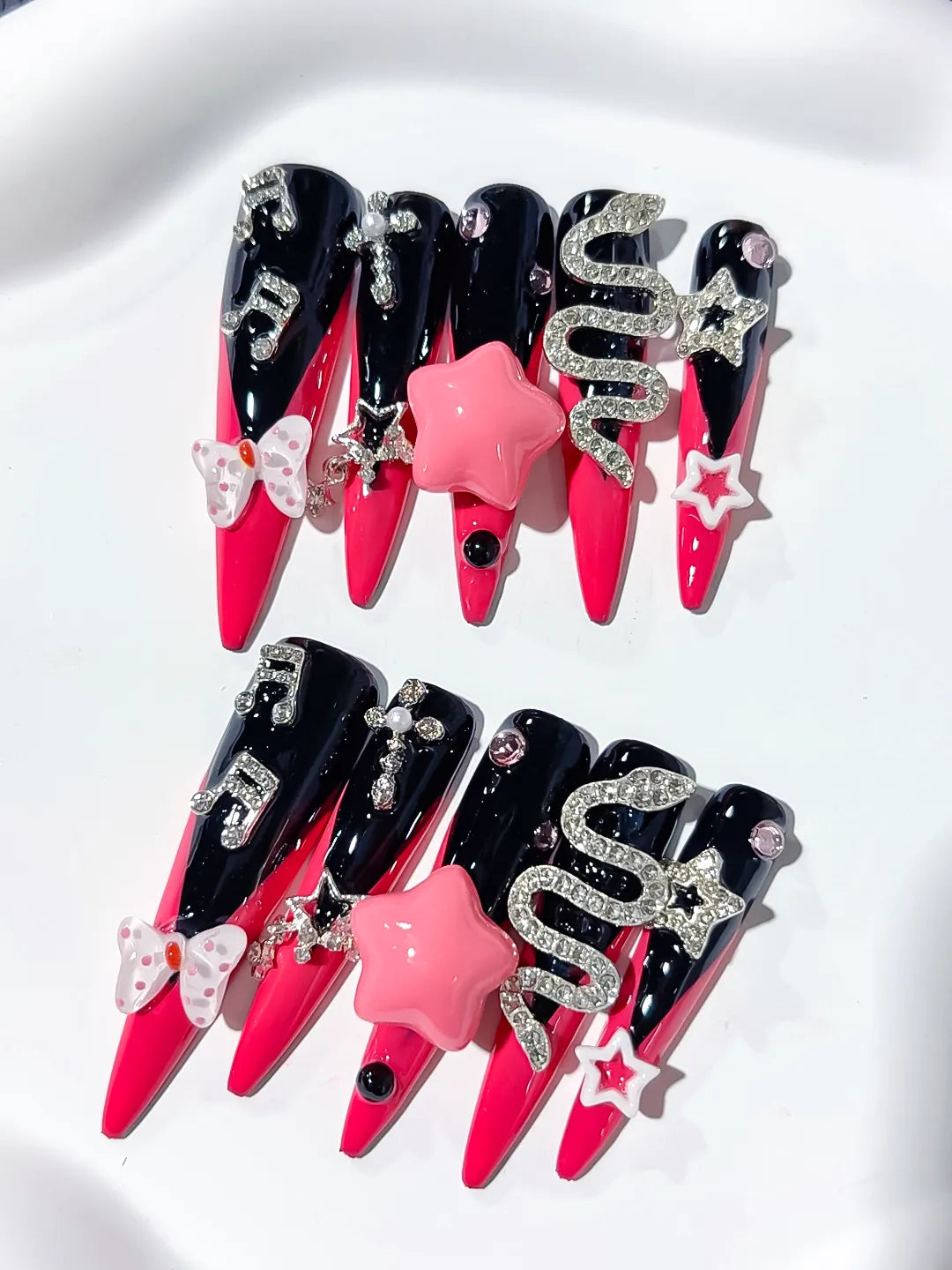 M101 - Long Pink Black Stiletto Abstract Bow Rhinestone