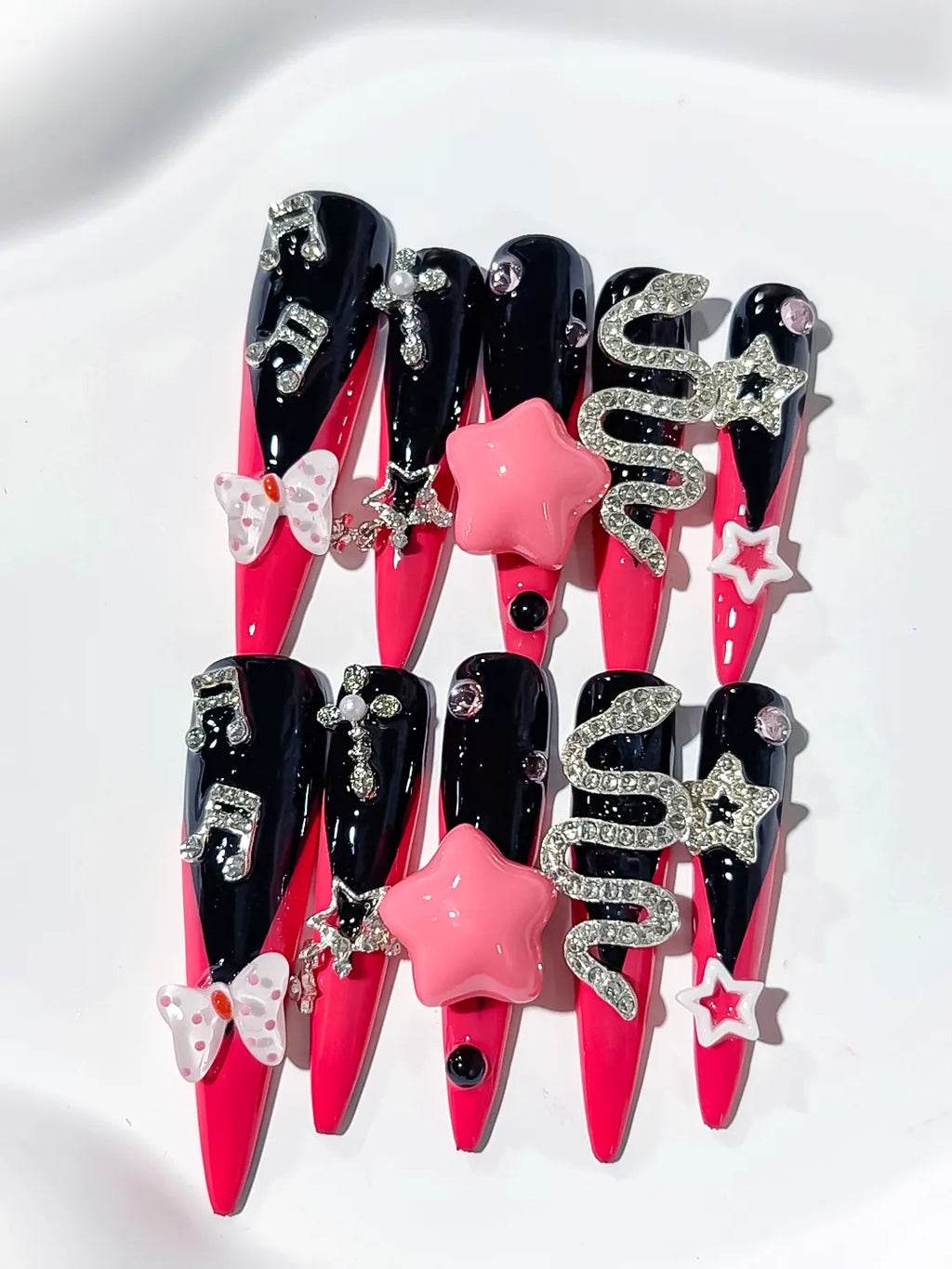 M101 - Long Pink Black Stiletto Abstract Bow Rhinestone