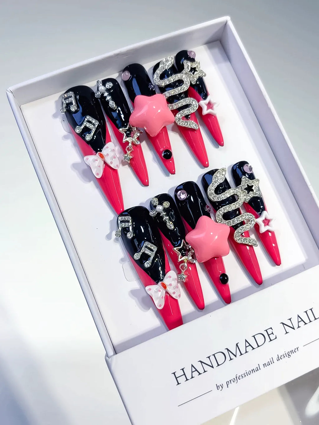 M101 - Long Pink Black Stiletto Abstract Bow Rhinestone