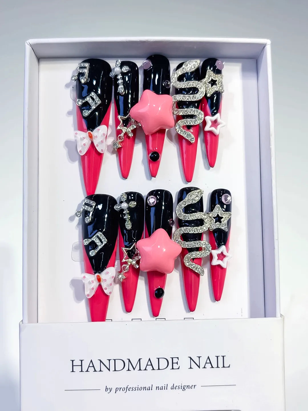 M101 - Long Pink Black Stiletto Abstract Bow Rhinestone