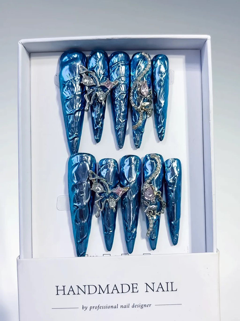 M107 - Long Blue Silver Stiletto Glitter Rhinestone