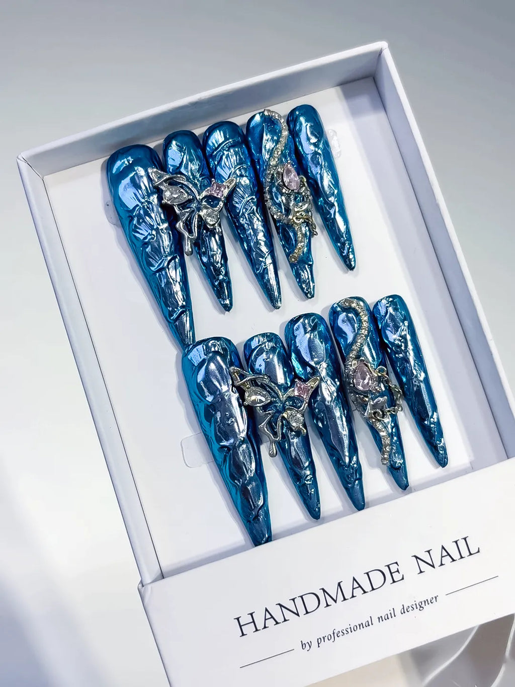 M107 - Long Blue Silver Stiletto Glitter Rhinestone