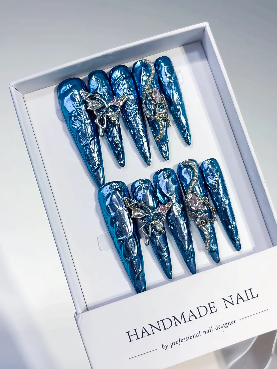 M107 - Long Blue Silver Stiletto Glitter Rhinestone