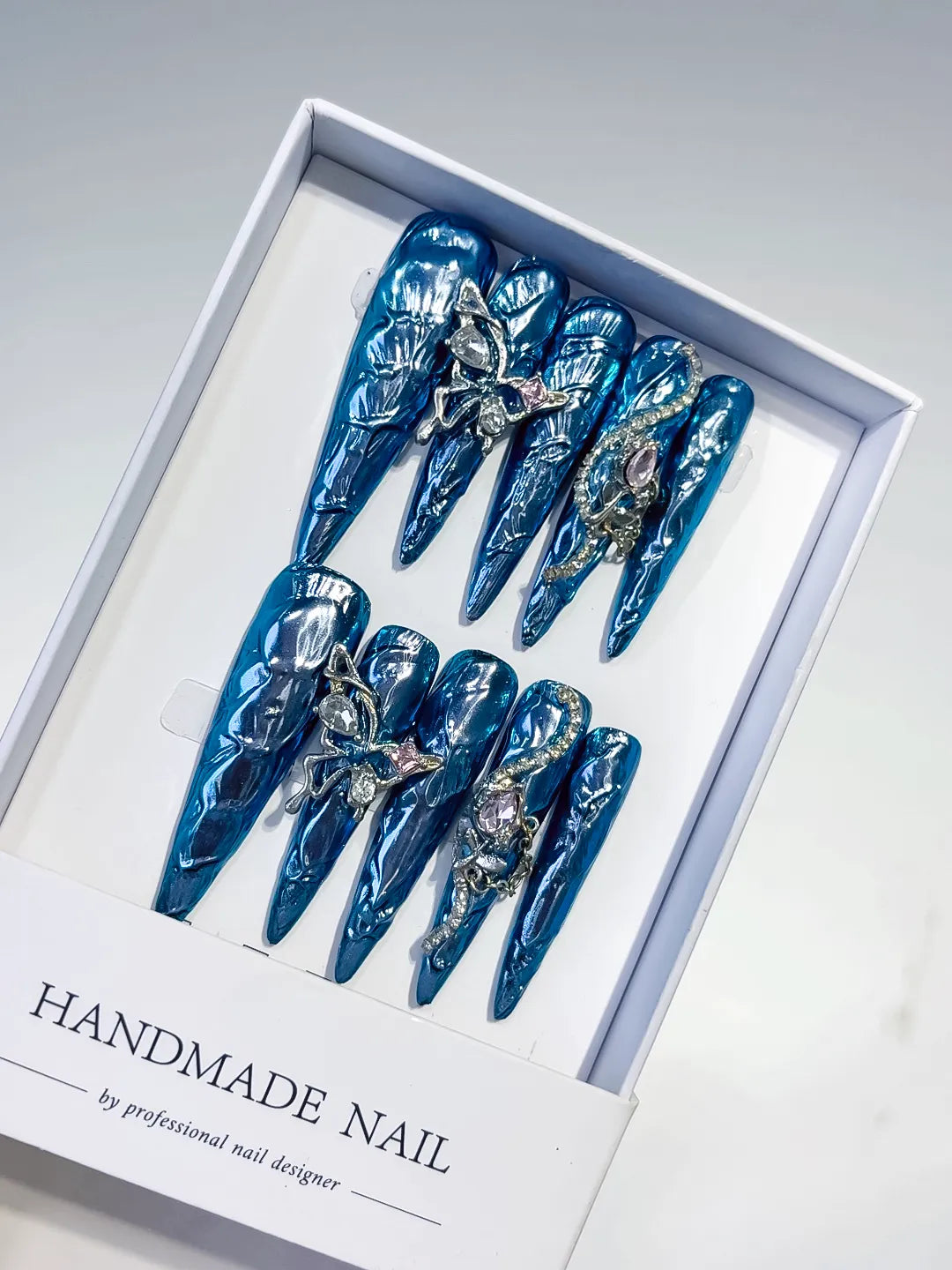 M107 - Long Blue Silver Stiletto Glitter Rhinestone
