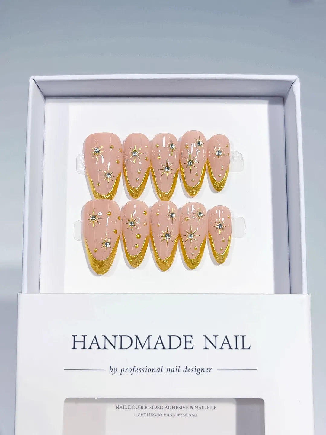 C378 - Medium Nude Gold Almond French tip Rhinestone
