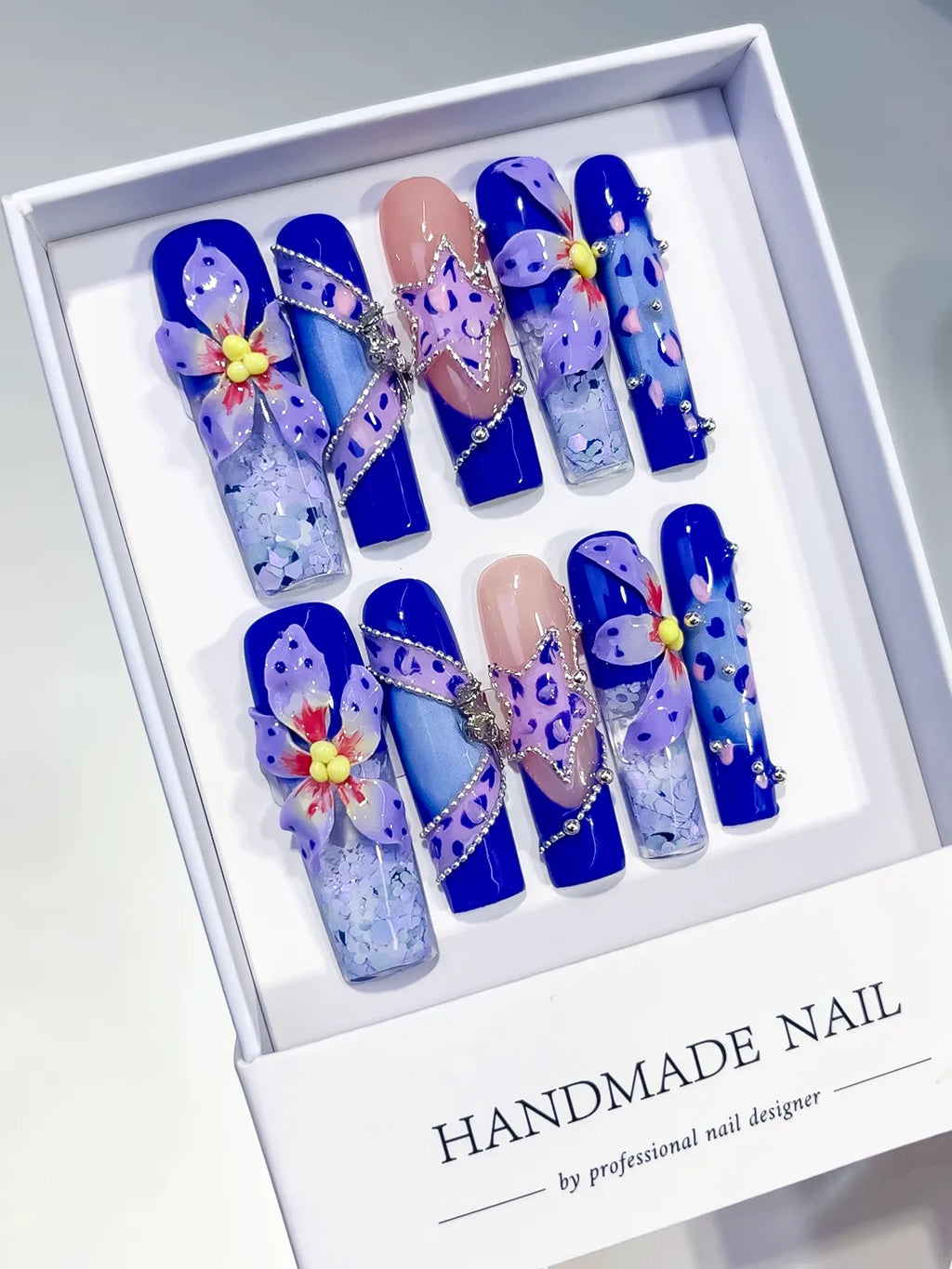 O003 - Long Blue Nude Square Abstract Flower Glitter