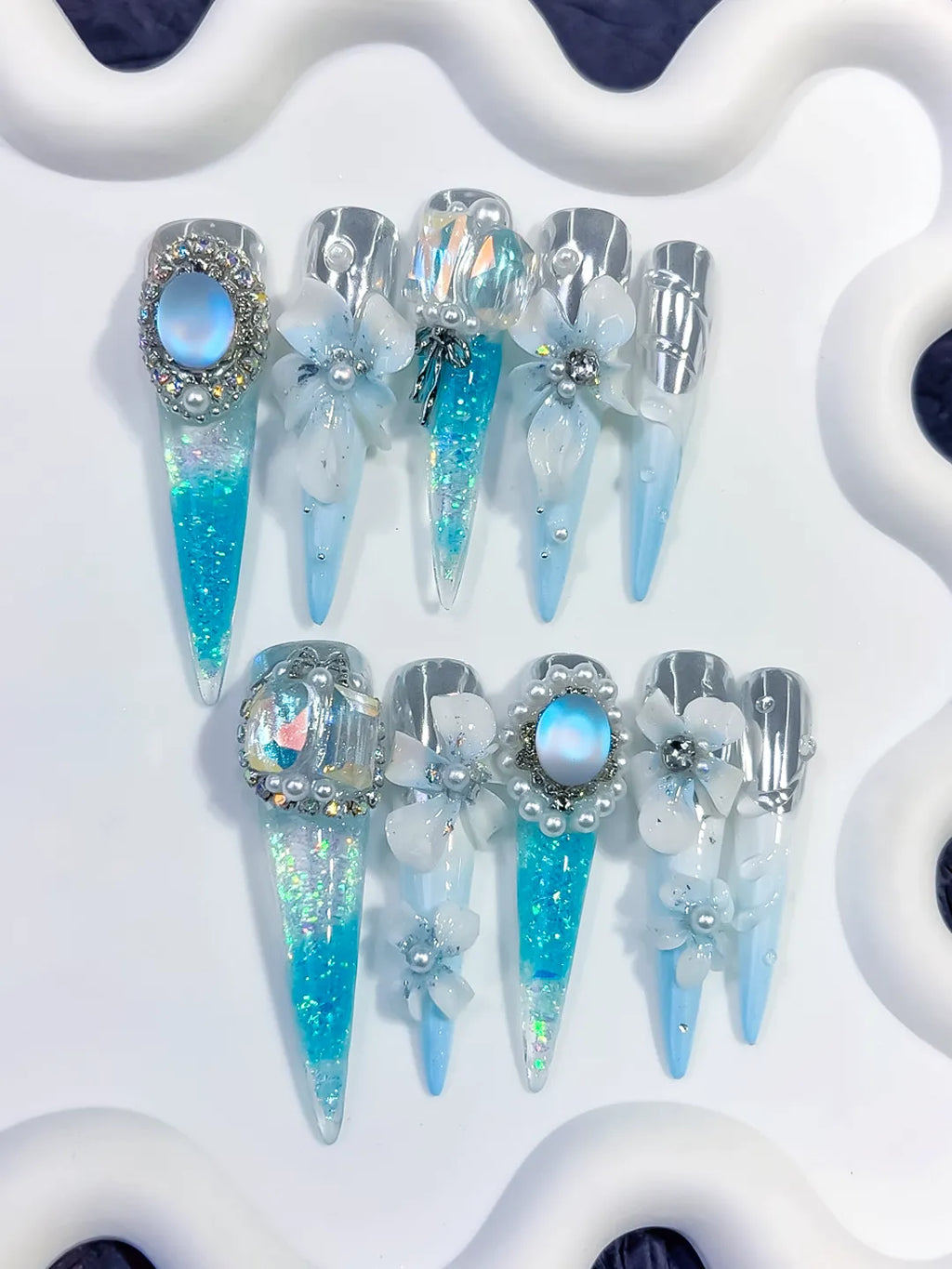 O005 - Long Blue White Stiletto Glitter Flower Pearl