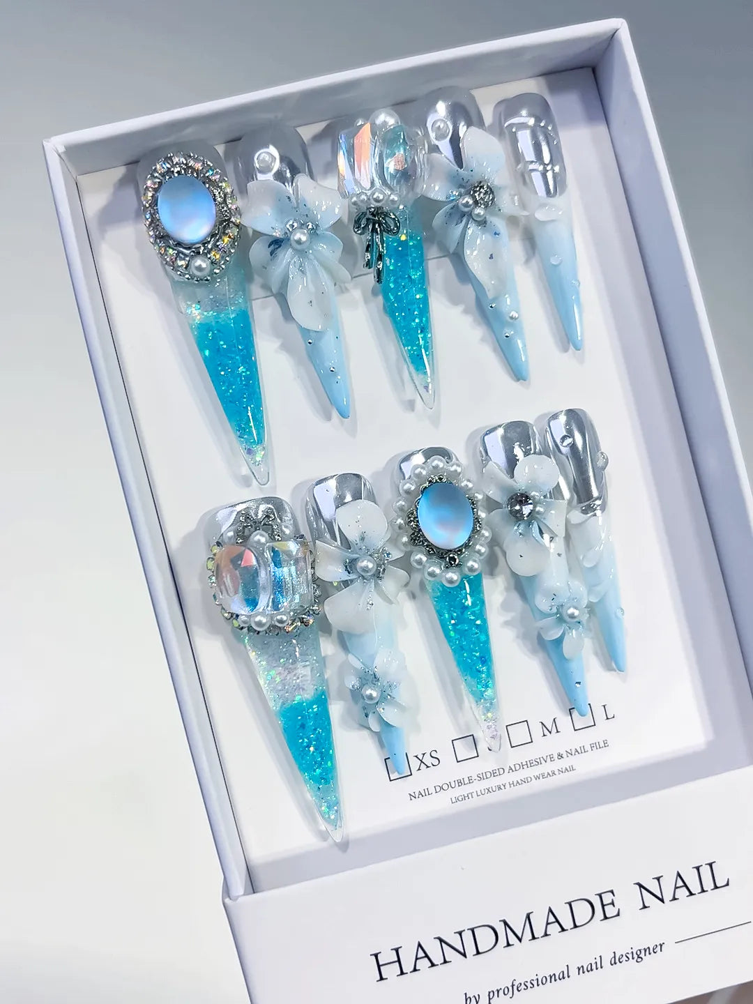 O005 - Long Blue White Stiletto Glitter Flower Pearl