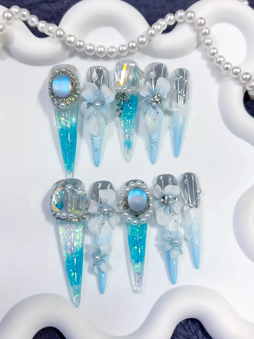 O005 - Long Blue White Stiletto Glitter Flower Pearl