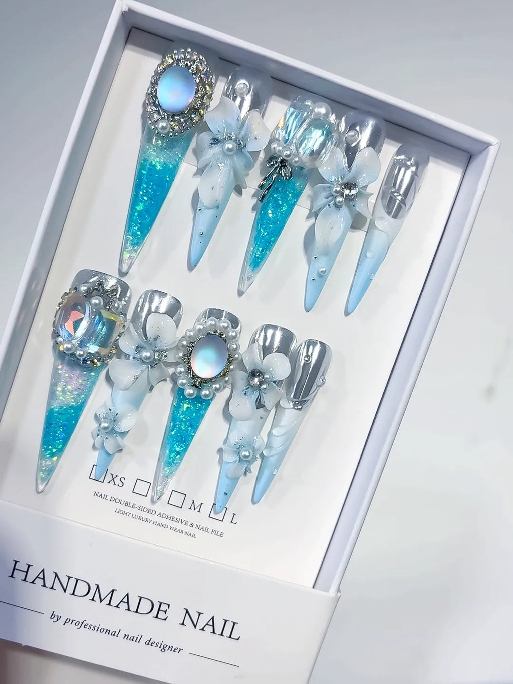 O005 - Long Blue White Stiletto Glitter Flower Pearl