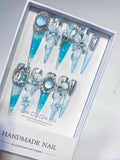 O005 - Long Blue White Stiletto Glitter Flower Pearl