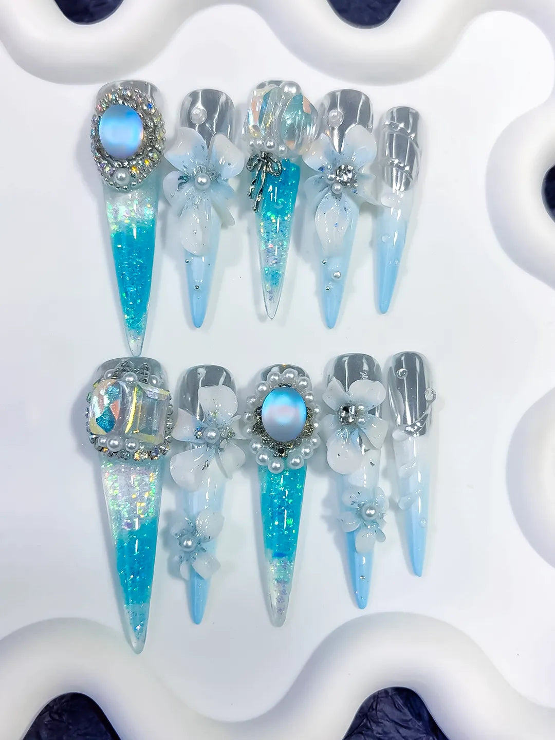 O005 - Long Blue White Stiletto Glitter Flower Pearl