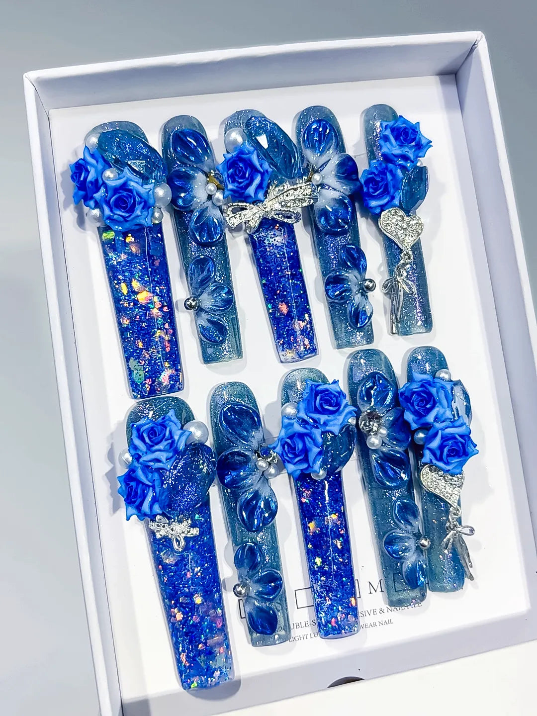 O013 - Long Blue Silver Square Glitter Rose Bow