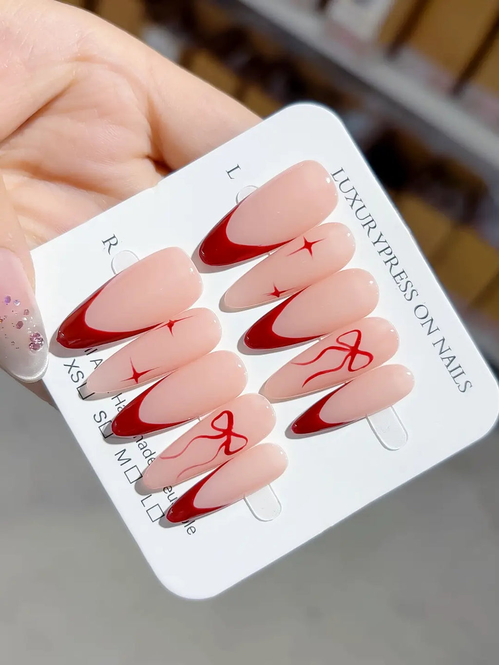 B102 - Long Nude Red Almond French tip Bow