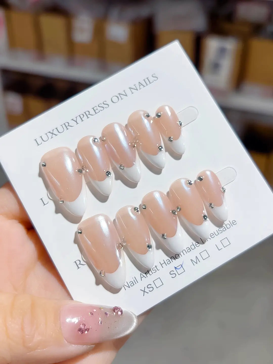 B104 - Medium Nude Almond French tip Rhinestone VibeNailsLab