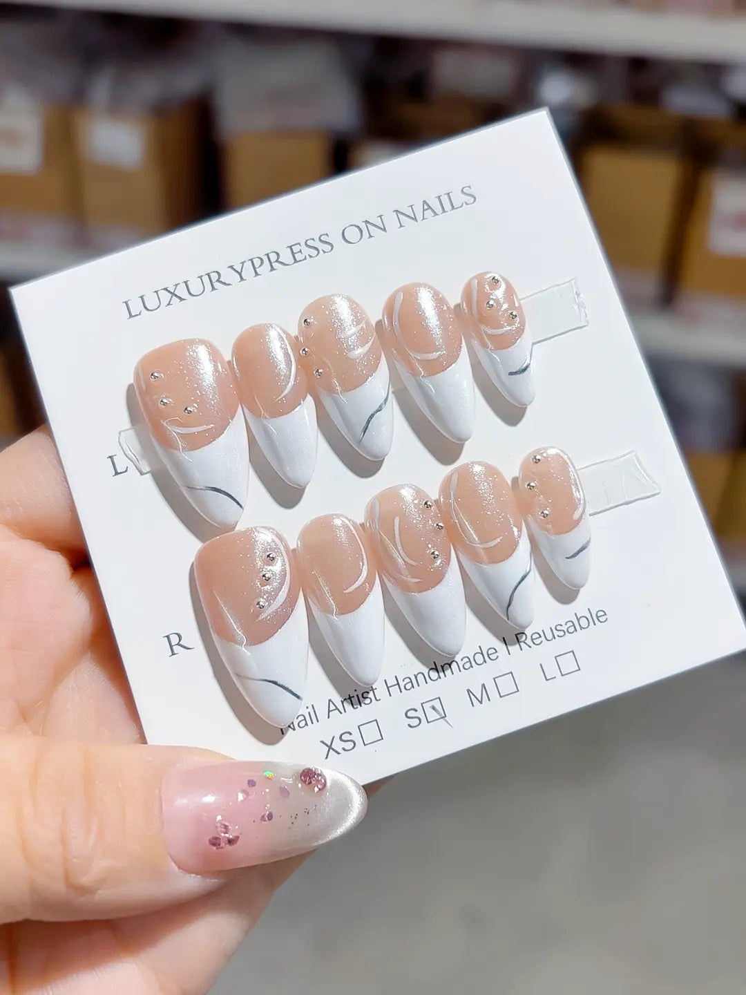 B094 - Medium White Nude Stiletto French tip Rhinestone Swirl VibeNailsLab