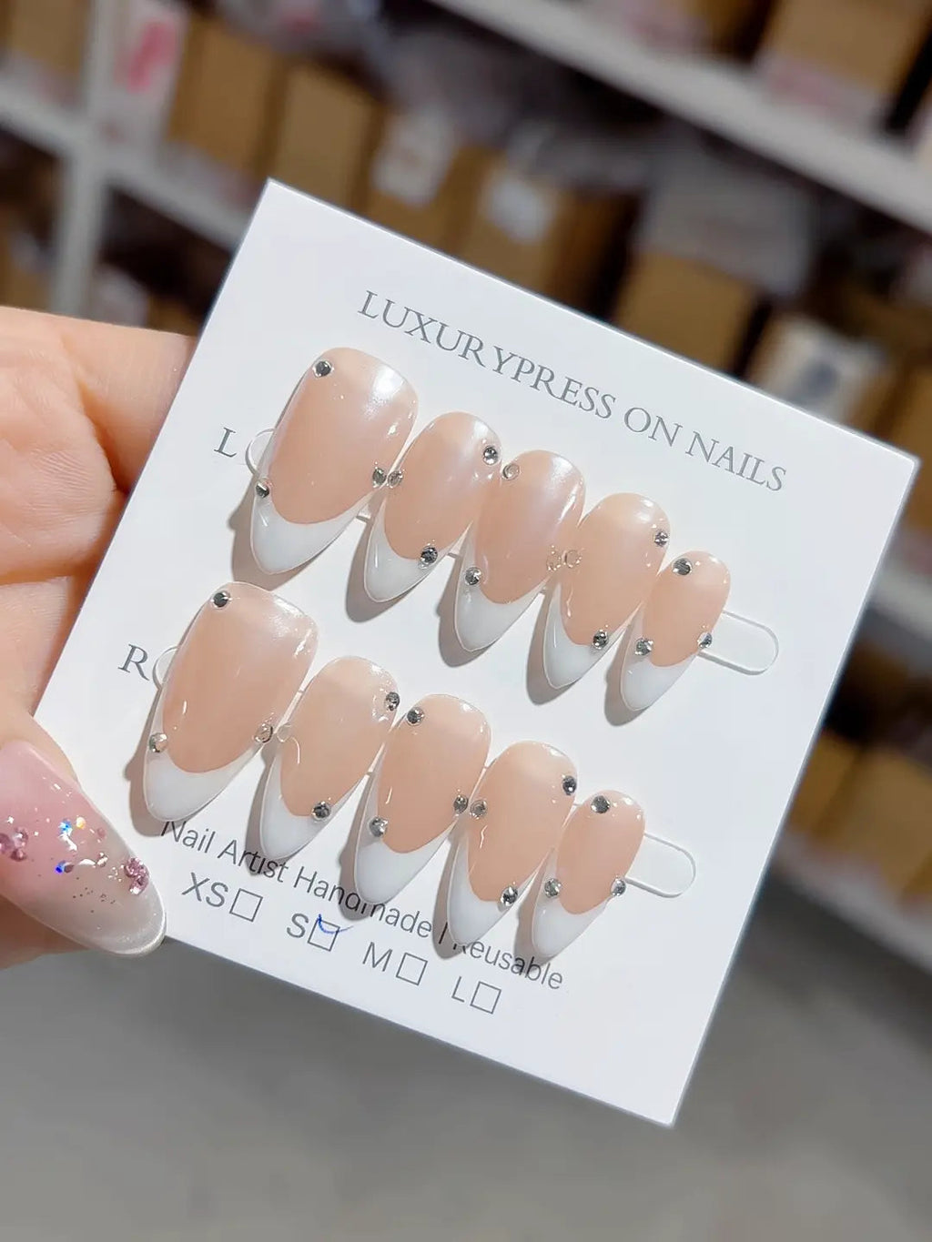 B104 - Medium Nude Almond French tip Rhinestone VibeNailsLab