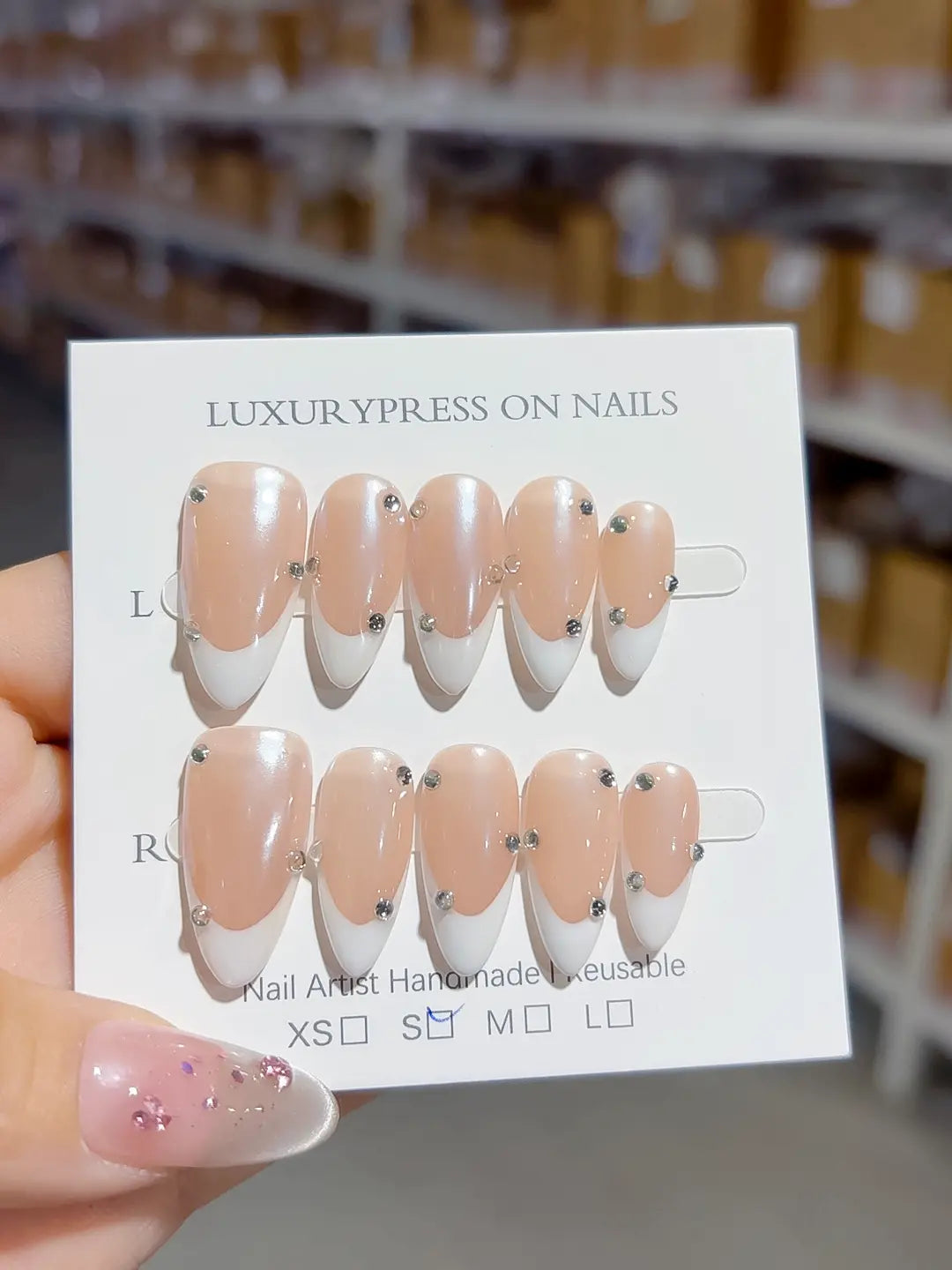 B104 - Medium Nude Almond French tip Rhinestone VibeNailsLab