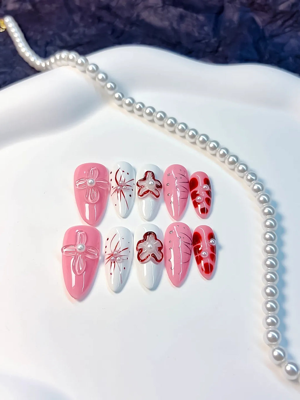 D247 - Medium Pink White Almond Abstract Bow Flower