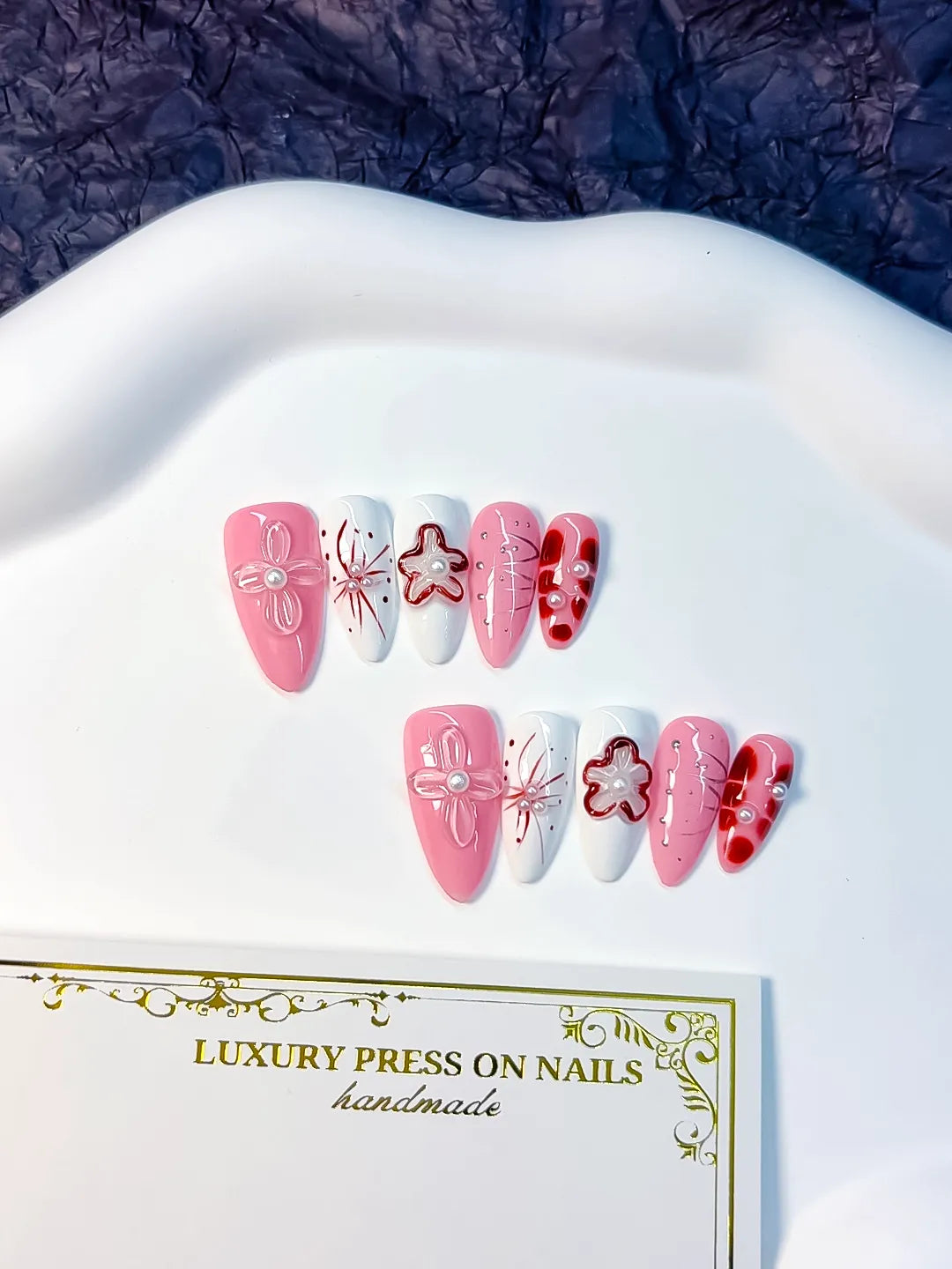 D247 - Medium Pink White Almond Abstract Bow Flower