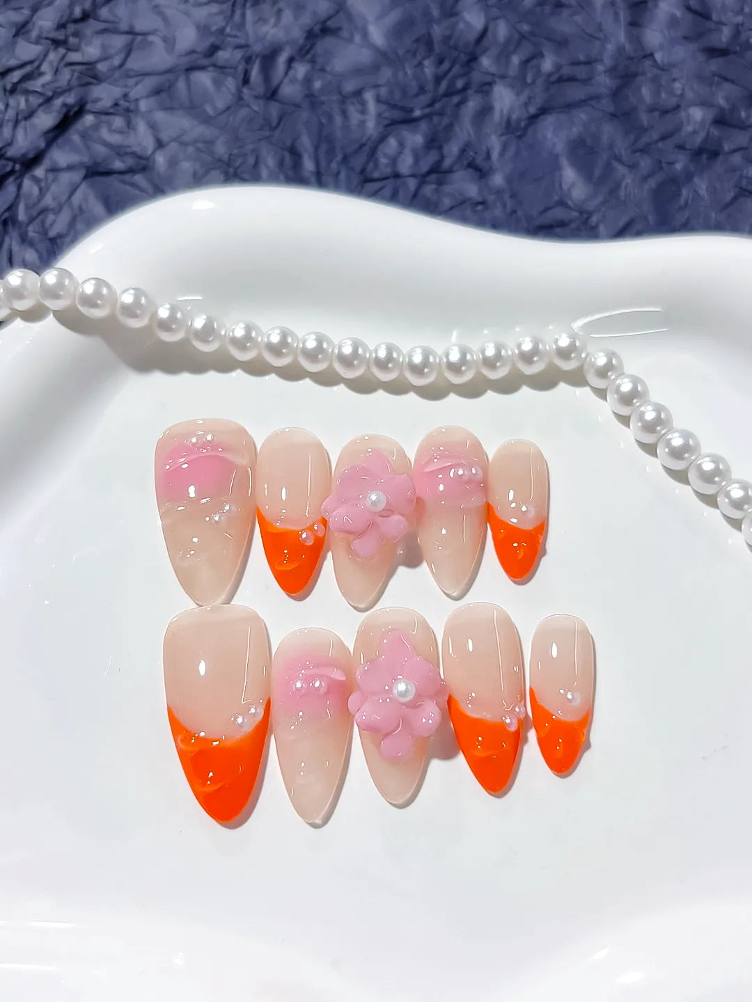 D261 - Medium Nude Orange Almond French tip Flower Pearl