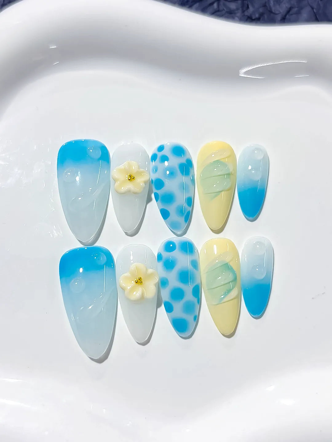 D266 - Medium Blue White Almond Abstract Flower Dot Pattern