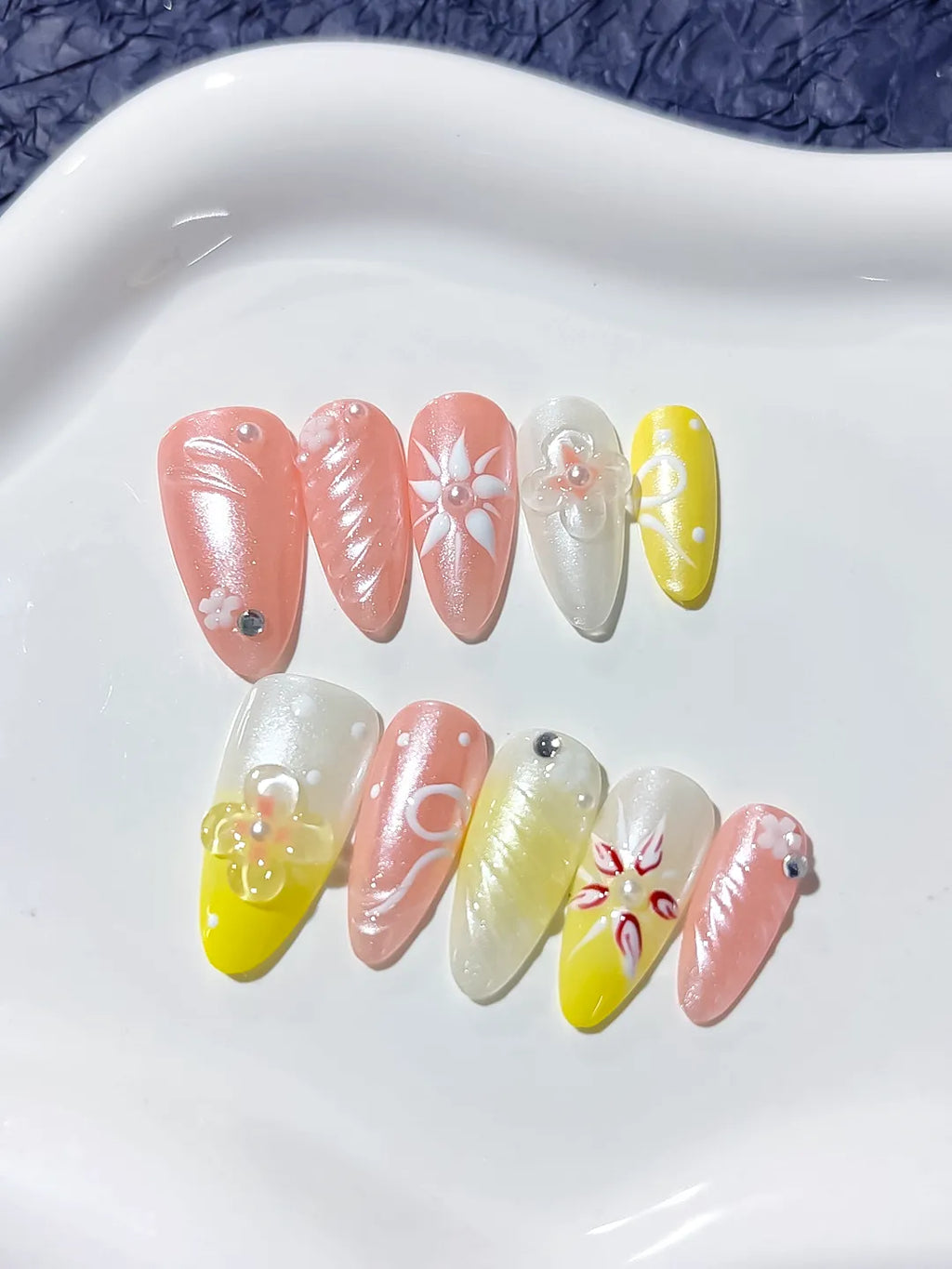 D311 - Medium Pink Yellow Almond Abstract Embossed Flower