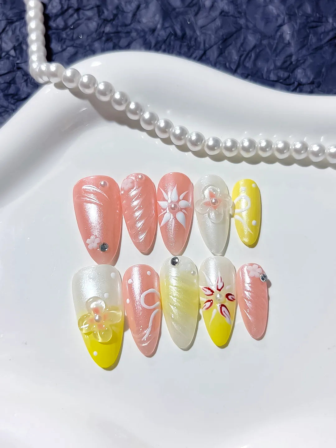 D311 - Medium Pink Yellow Almond Abstract Embossed Flower