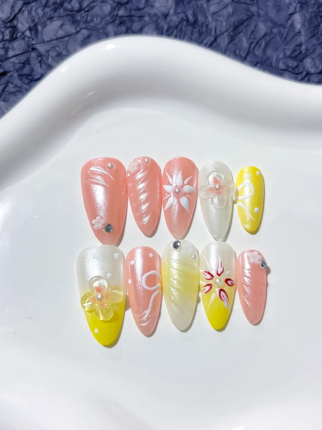 D311 - Medium Pink Yellow Almond Abstract Embossed Flower