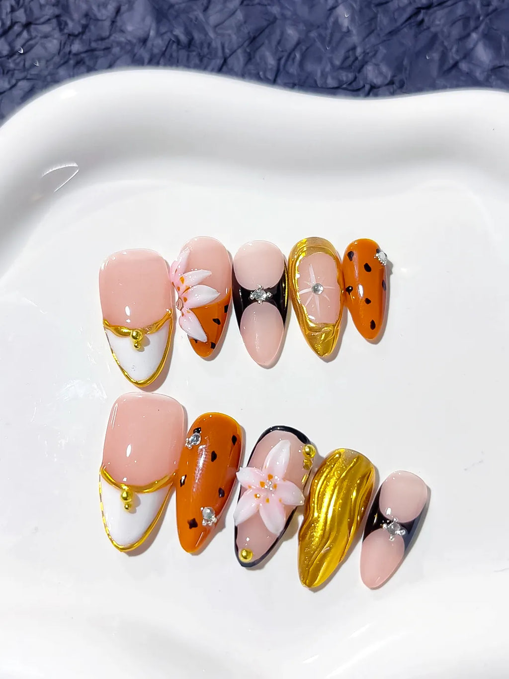 D309 - Medium Nude Orange Almond Abstract Flower Metallic