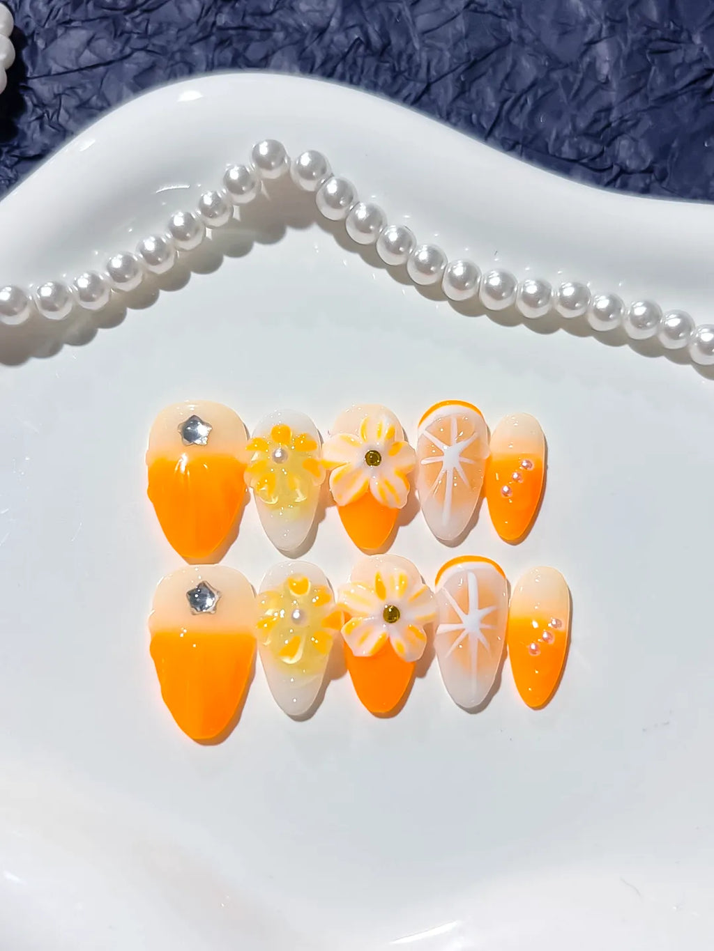 D299 - Medium Orange White Almond Floral Flower