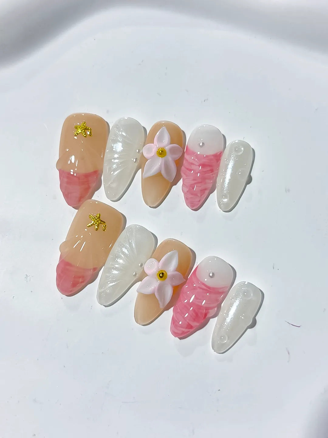 D338 - Medium Nude Pink Almond Abstract Flower Star VibeNailsLab