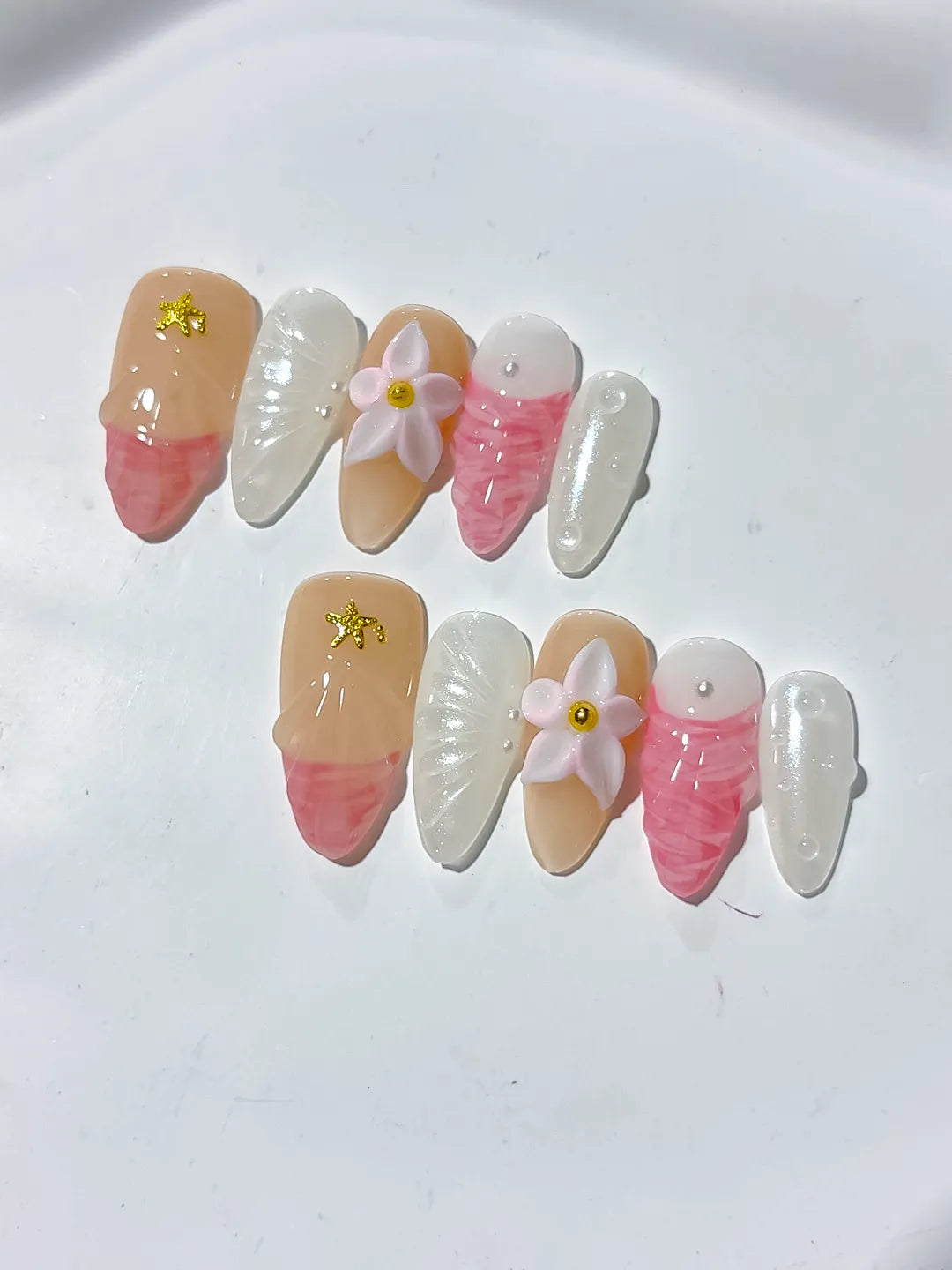 D338 - Medium Nude Pink Almond Abstract Flower Star VibeNailsLab