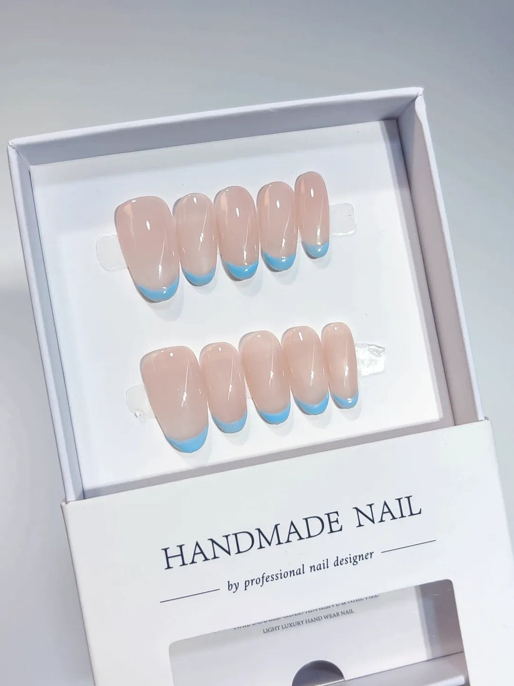 A056 - Medium Nude Blue Oval French tip VibeNailsLab