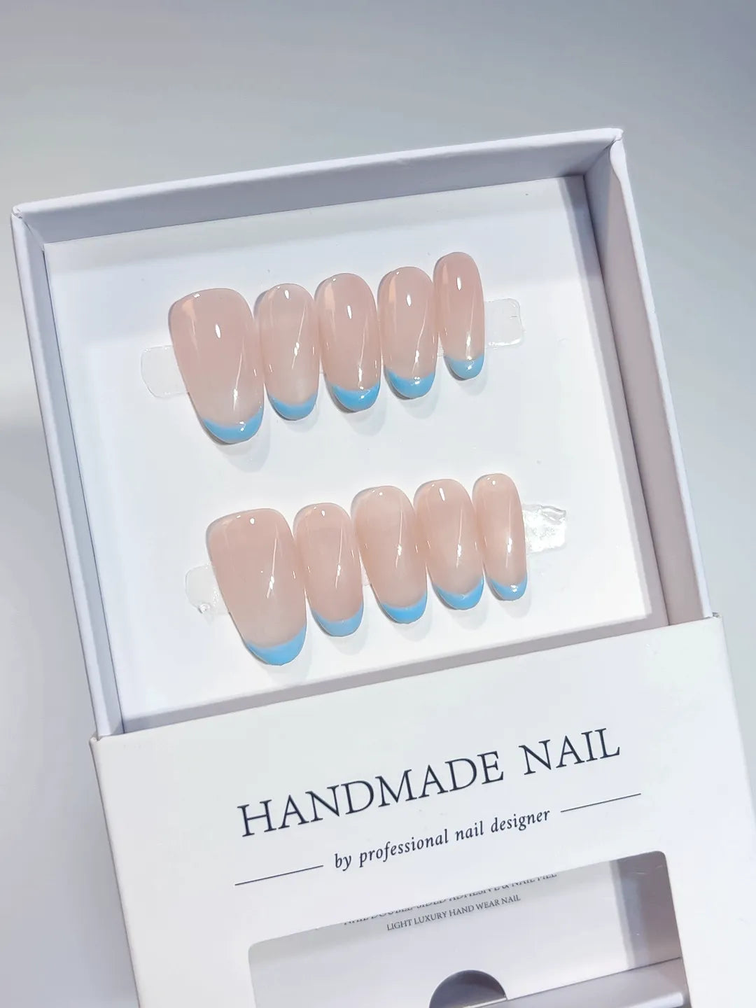 A056 - Medium Nude Blue Oval French tip VibeNailsLab
