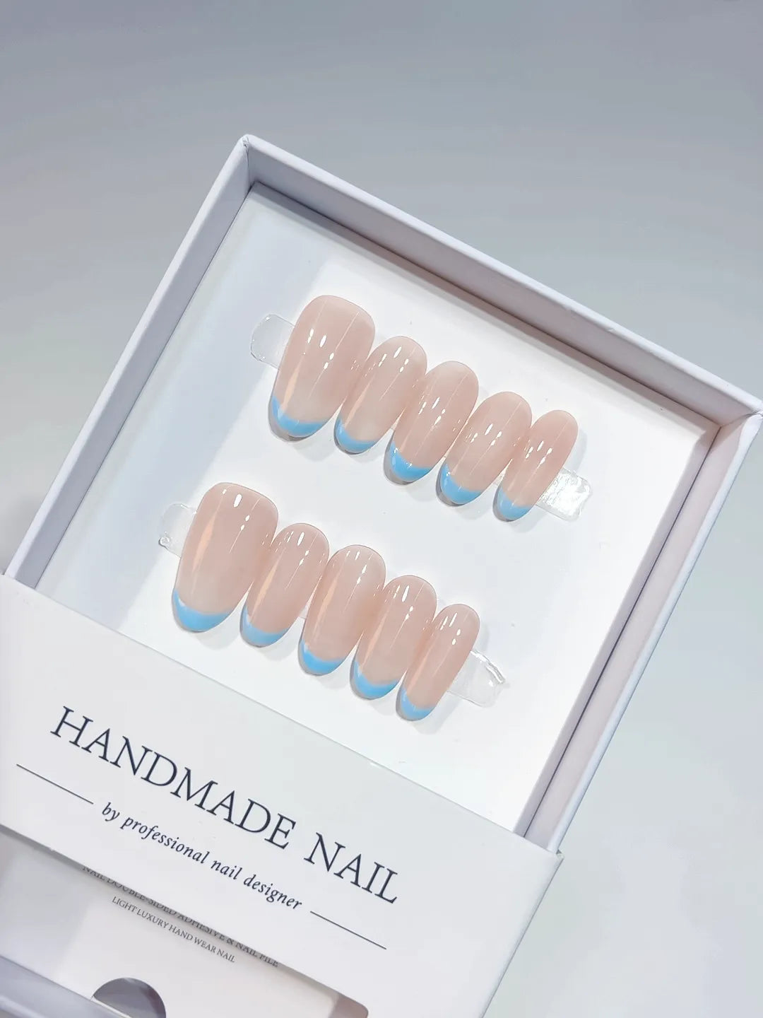 A056 - Medium Nude Blue Oval French tip VibeNailsLab