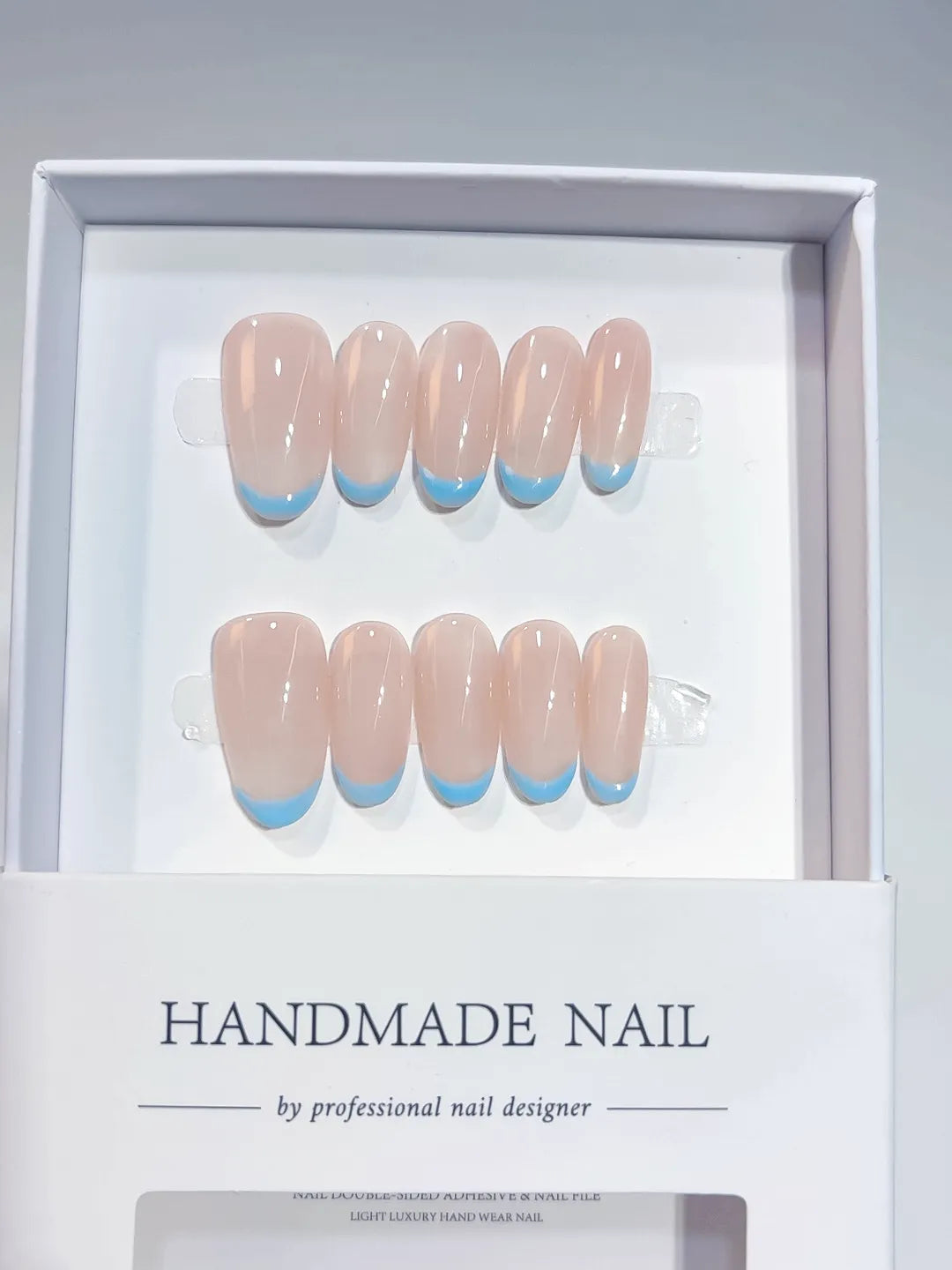 A056 - Medium Nude Blue Oval French tip VibeNailsLab