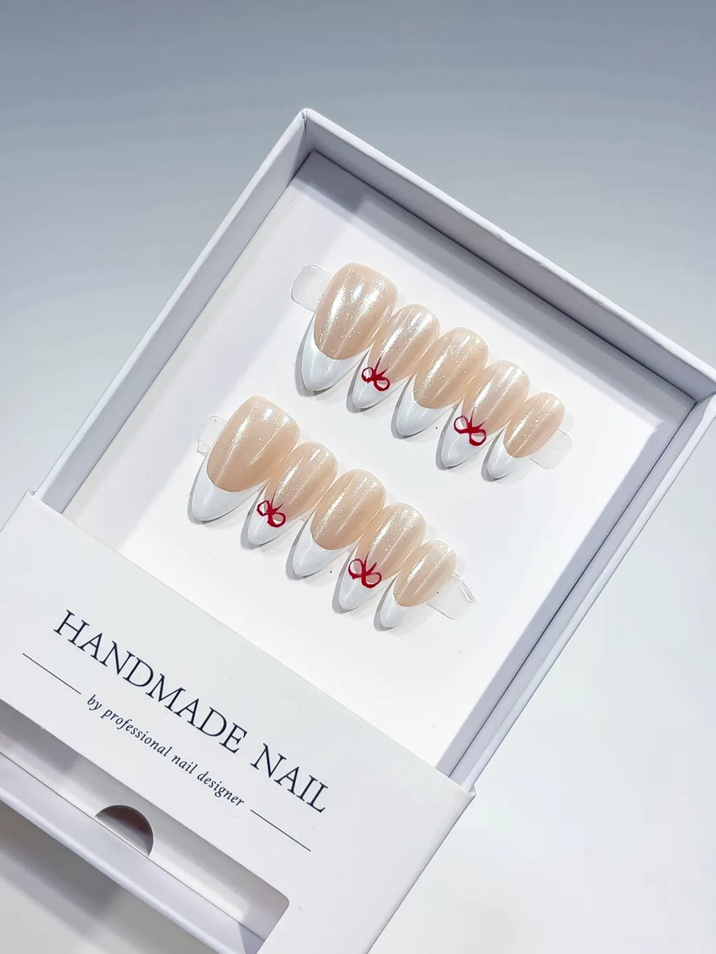 B095 - Medium White Nude Almond French tip Bow