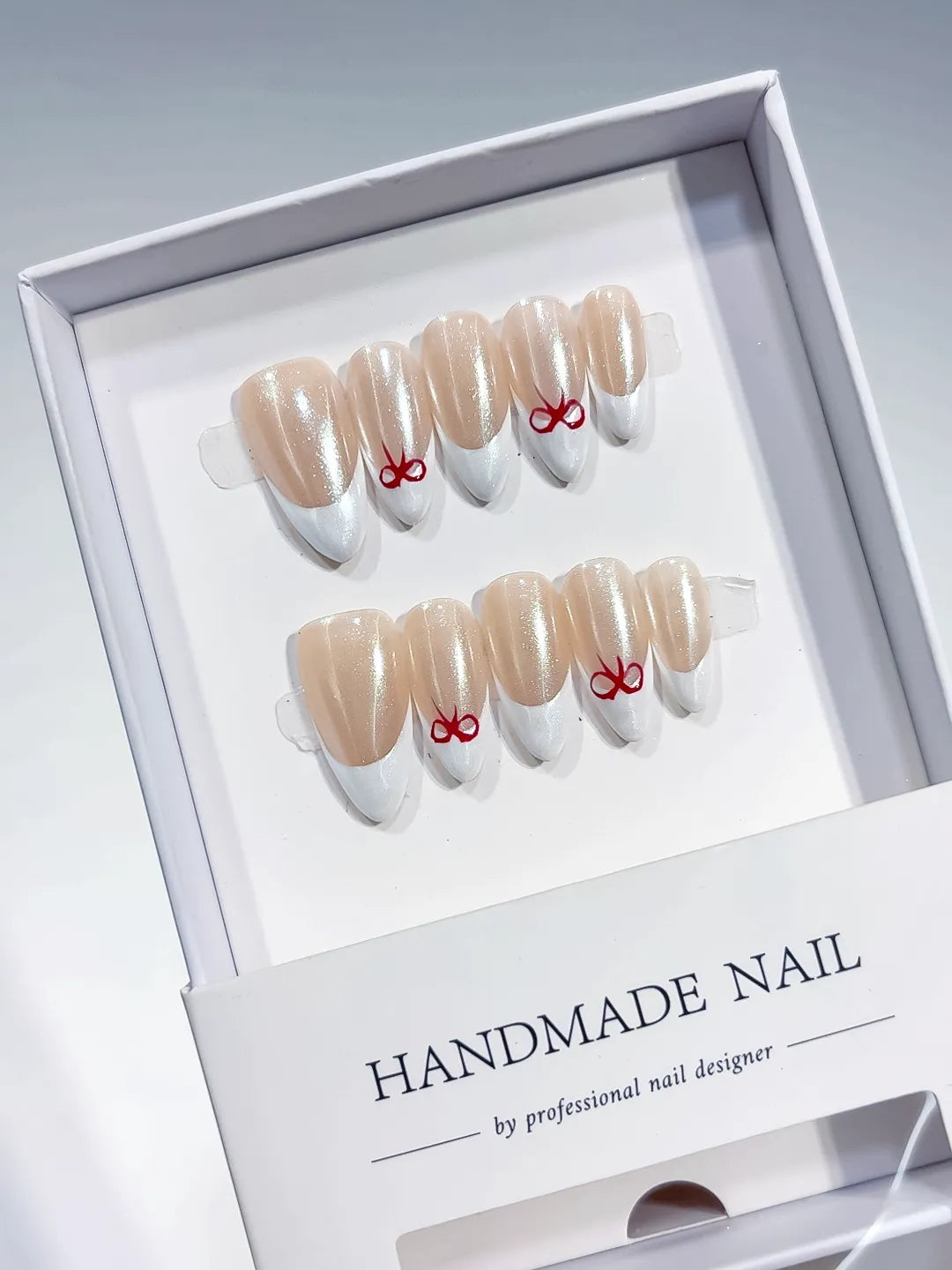 B095 - Medium White Nude Almond French tip Bow