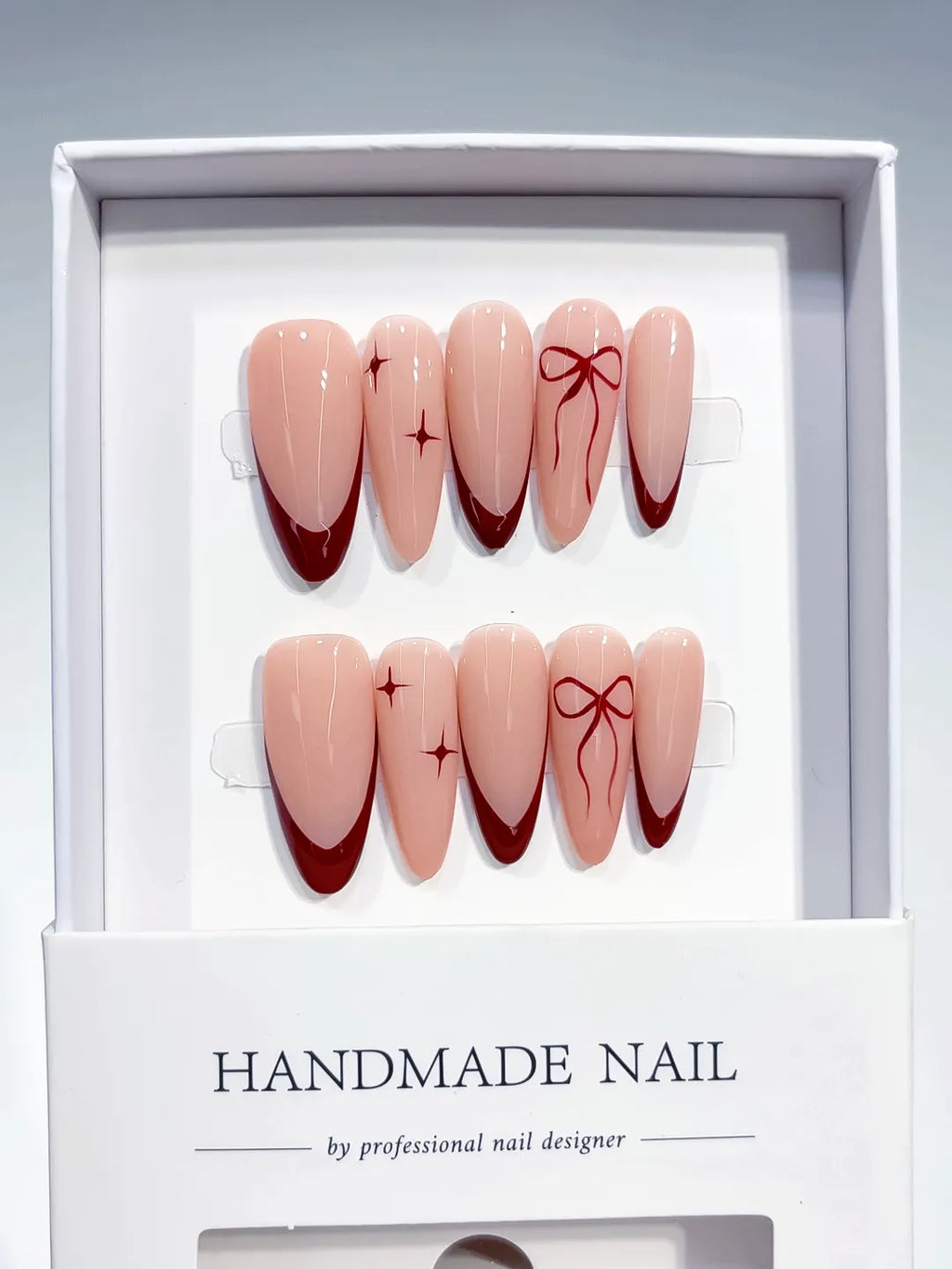 B102 - Long Nude Red Almond French tip Bow