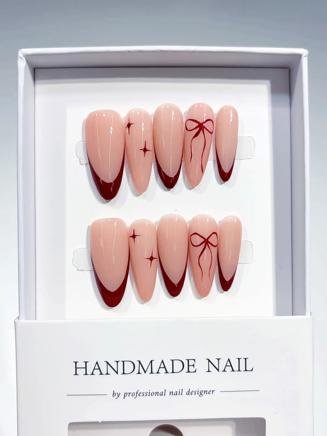 B102 - Long Nude Red Almond French tip Bow