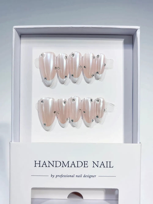 B104 - Medium Nude Almond French tip Rhinestone VibeNailsLab