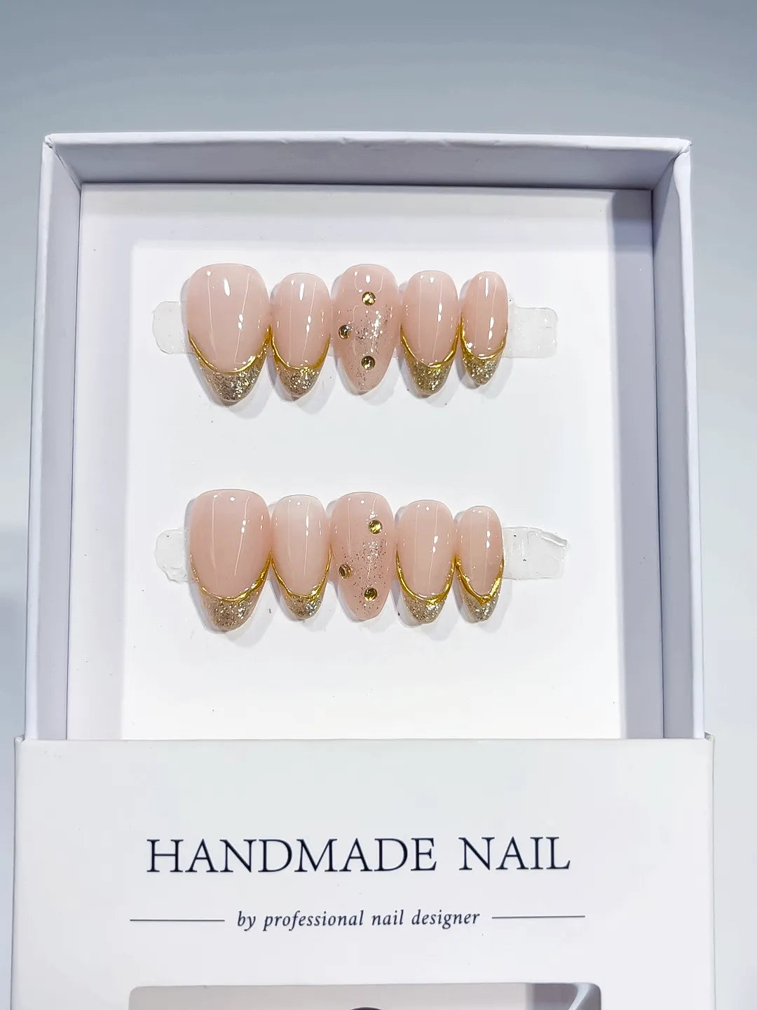 B109 - Short Nude Gold Almond French tip Rhinestone