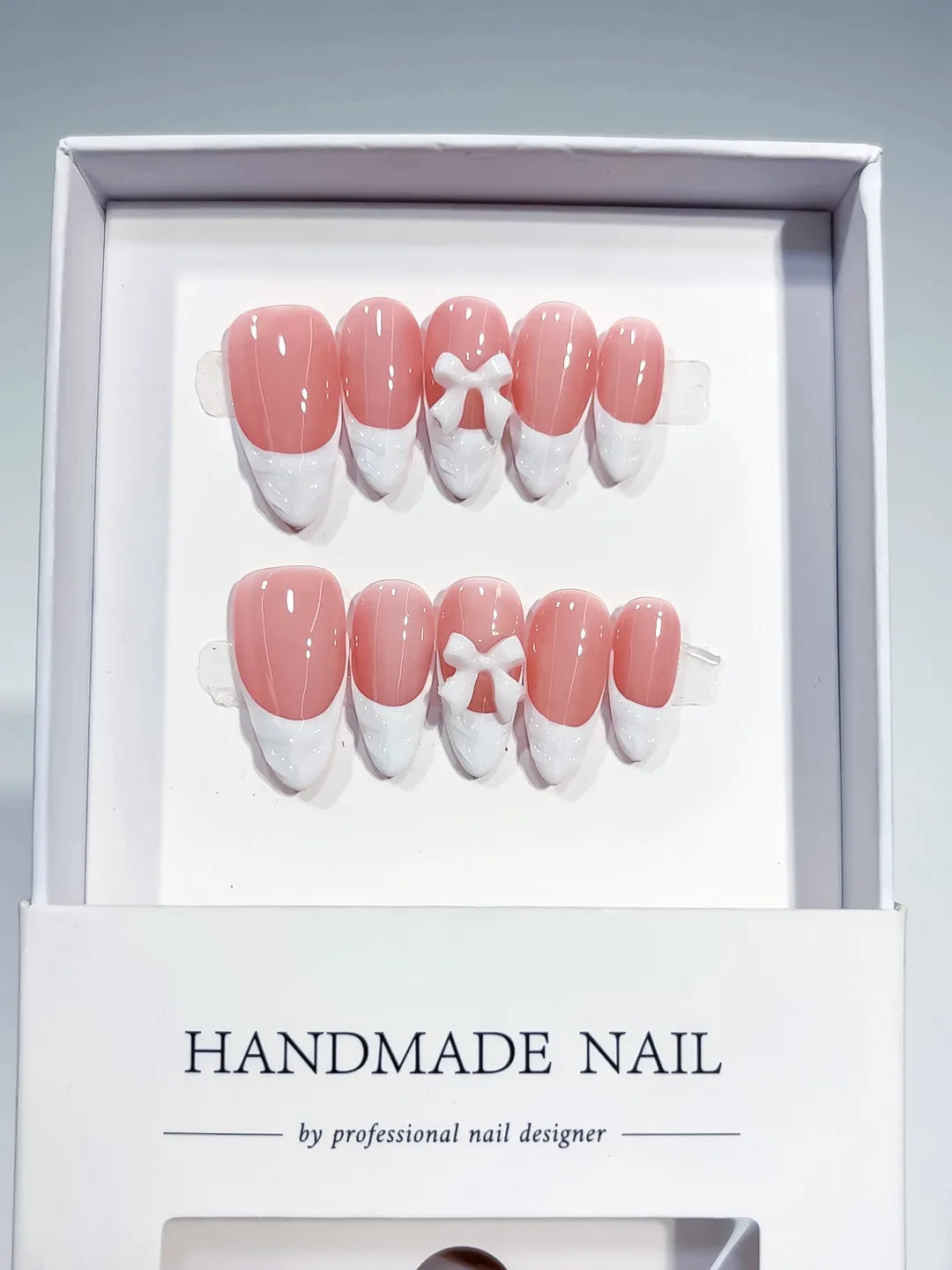B116 - Medium Pink White Almond French tip Bow