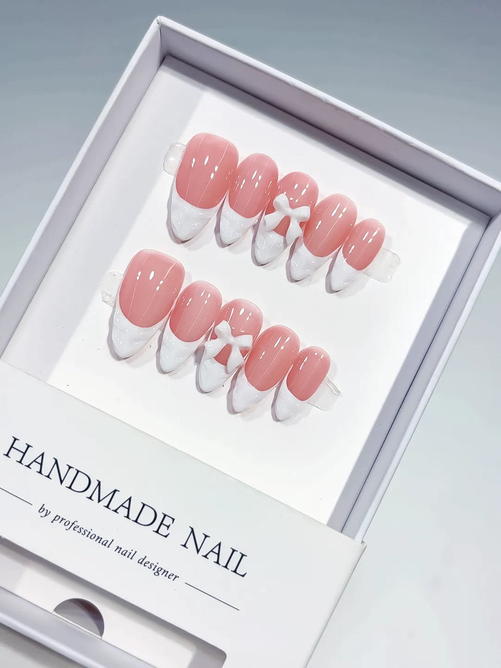 B116 - Medium Pink White Almond French tip Bow