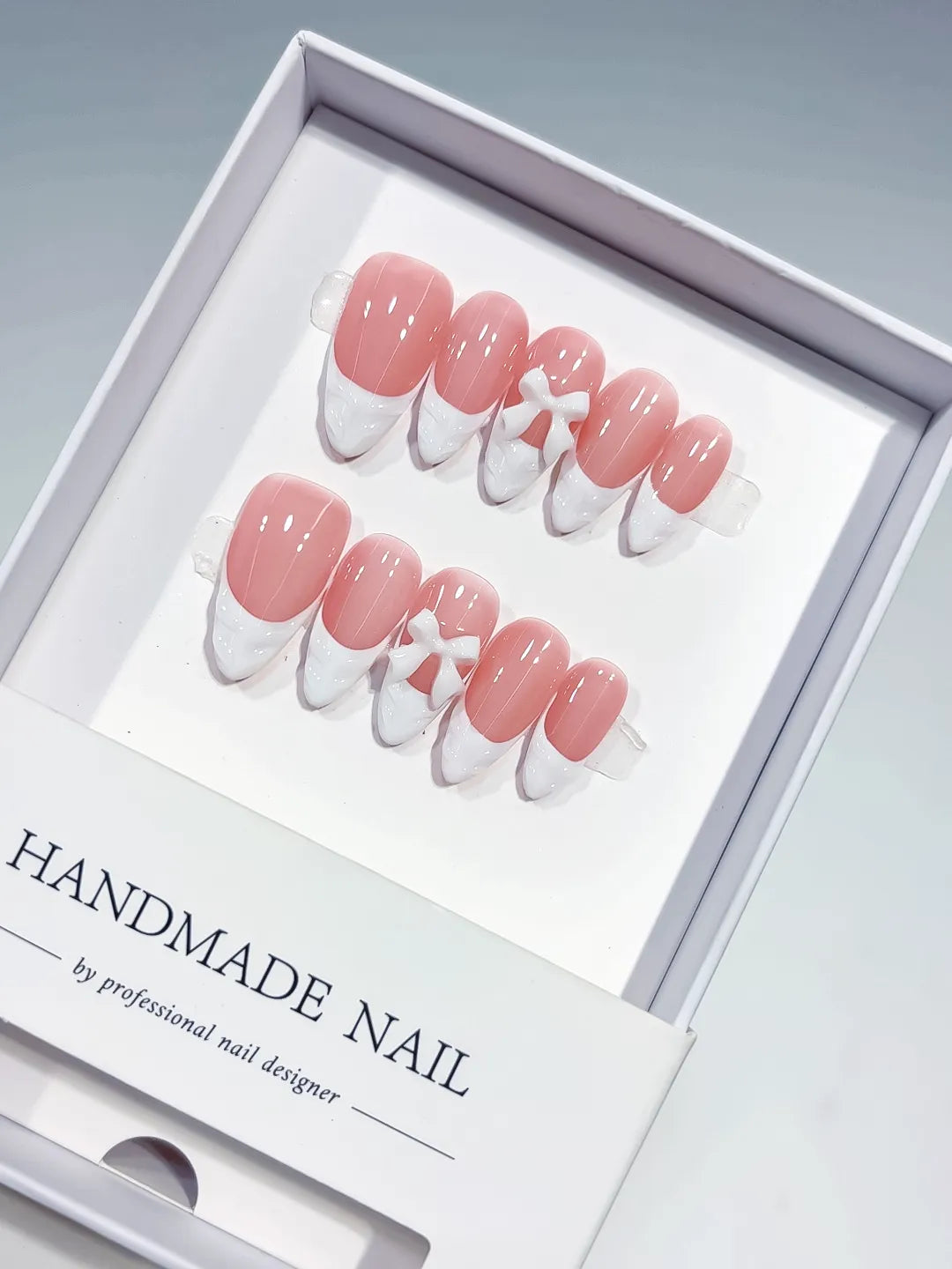 B116 - Medium Pink White Almond French tip Bow
