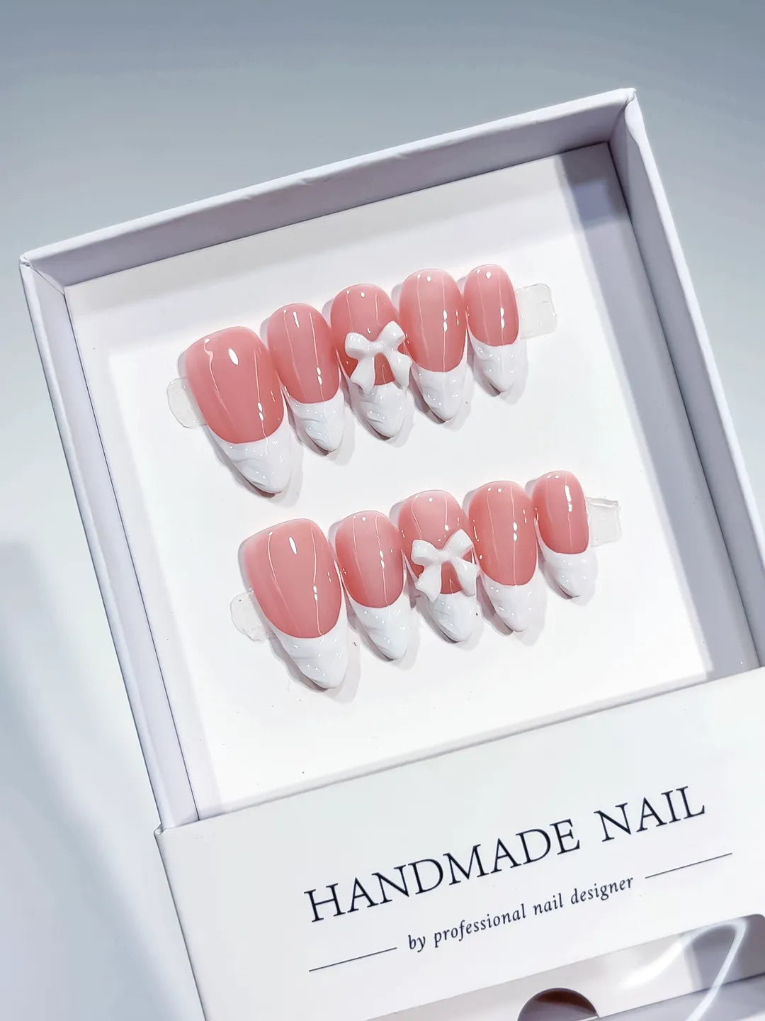 B116 - Medium Pink White Almond French tip Bow