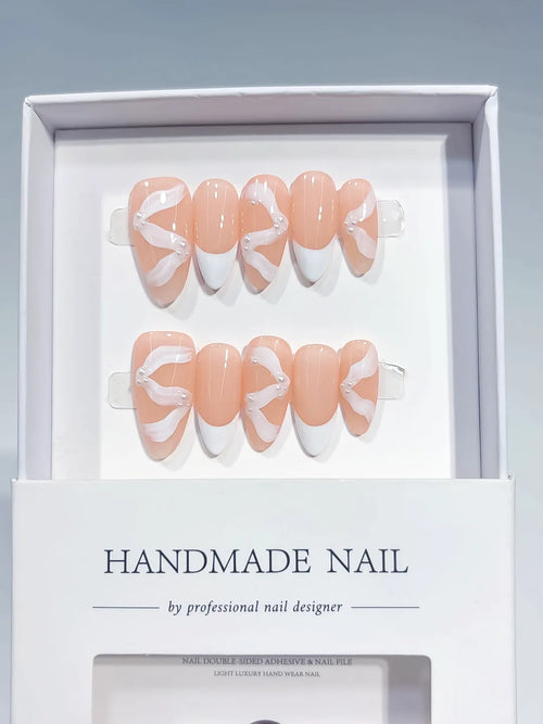 B123 - Short Nude White Almond French tip Bow Swirl