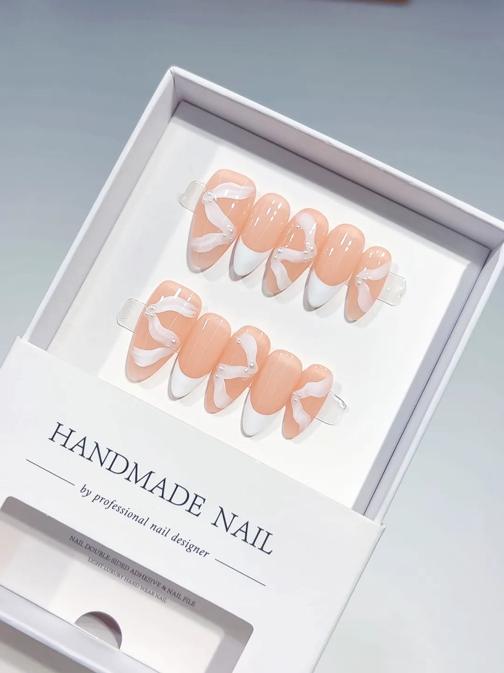 B123 - Short Nude White Almond French tip Bow Swirl